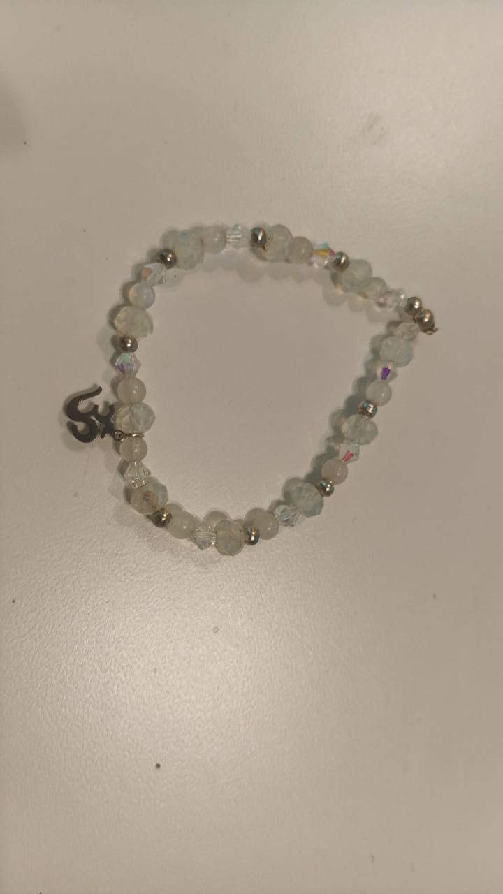 Pulsera piedra luna y cristales más dije de OM